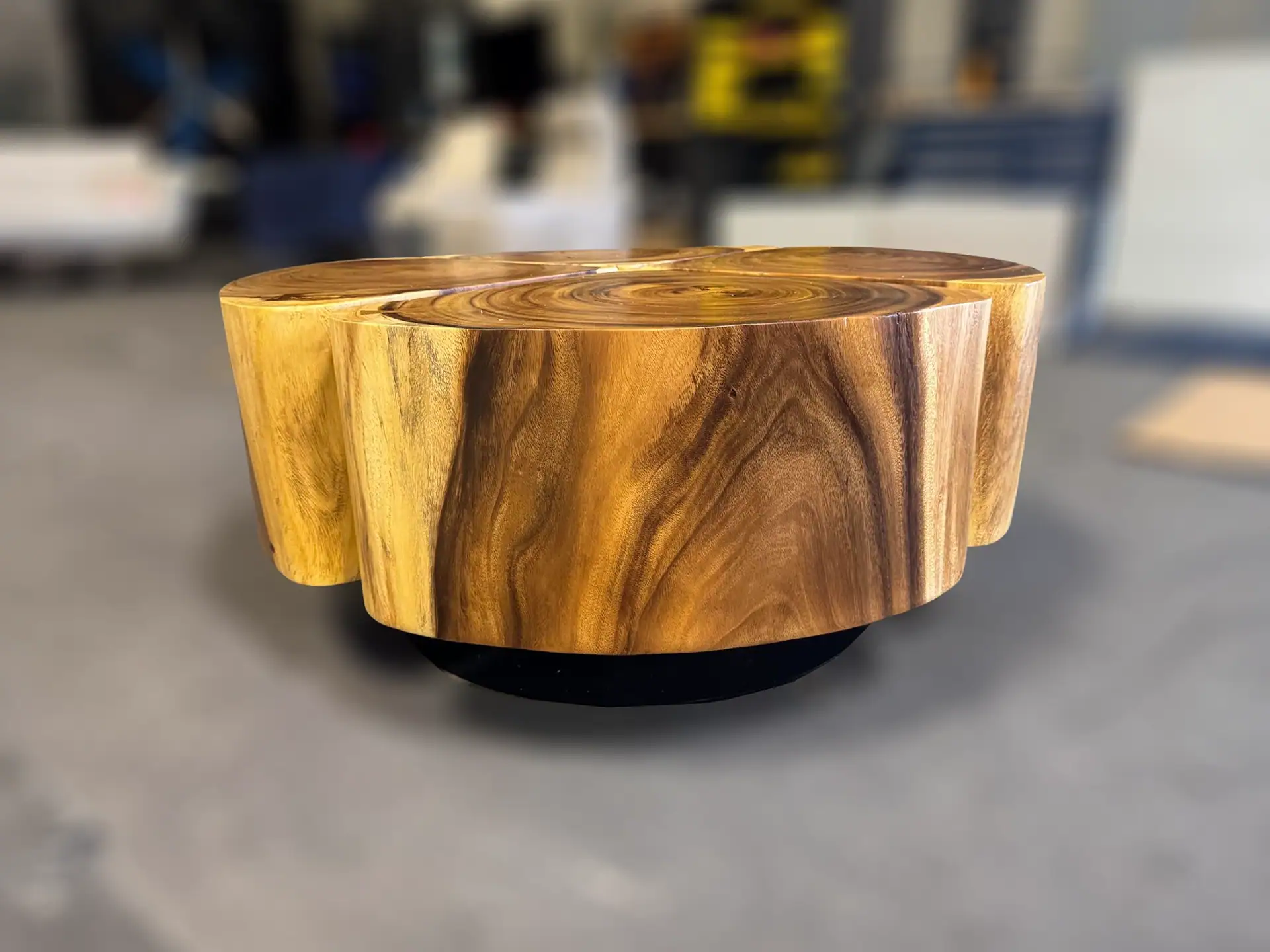 Sklar Furnishings wooden coffee table with a natural finish in a room setting.