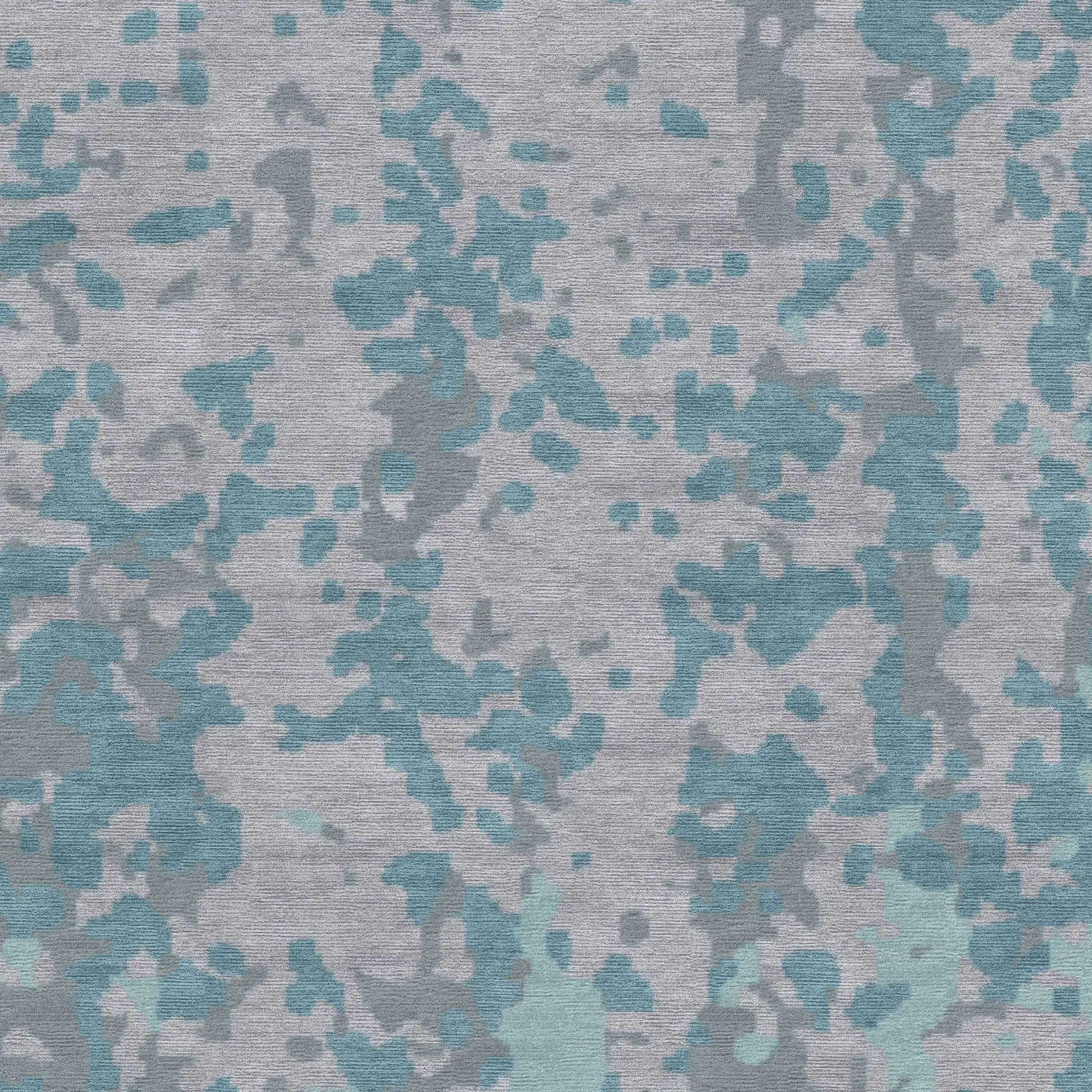 Abstract pattern area rug with blue and gray tones from Sklar Furnishings.