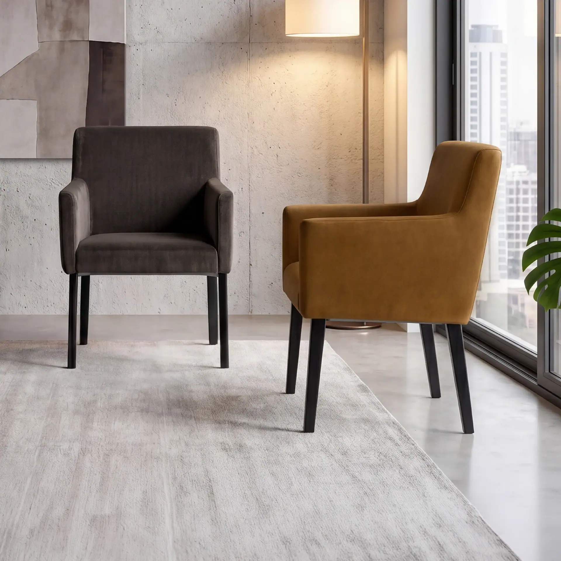 Two modern armchairs, one dark gray and one mustard yellow, on a light gray rug in a room with a city view and abstract art.