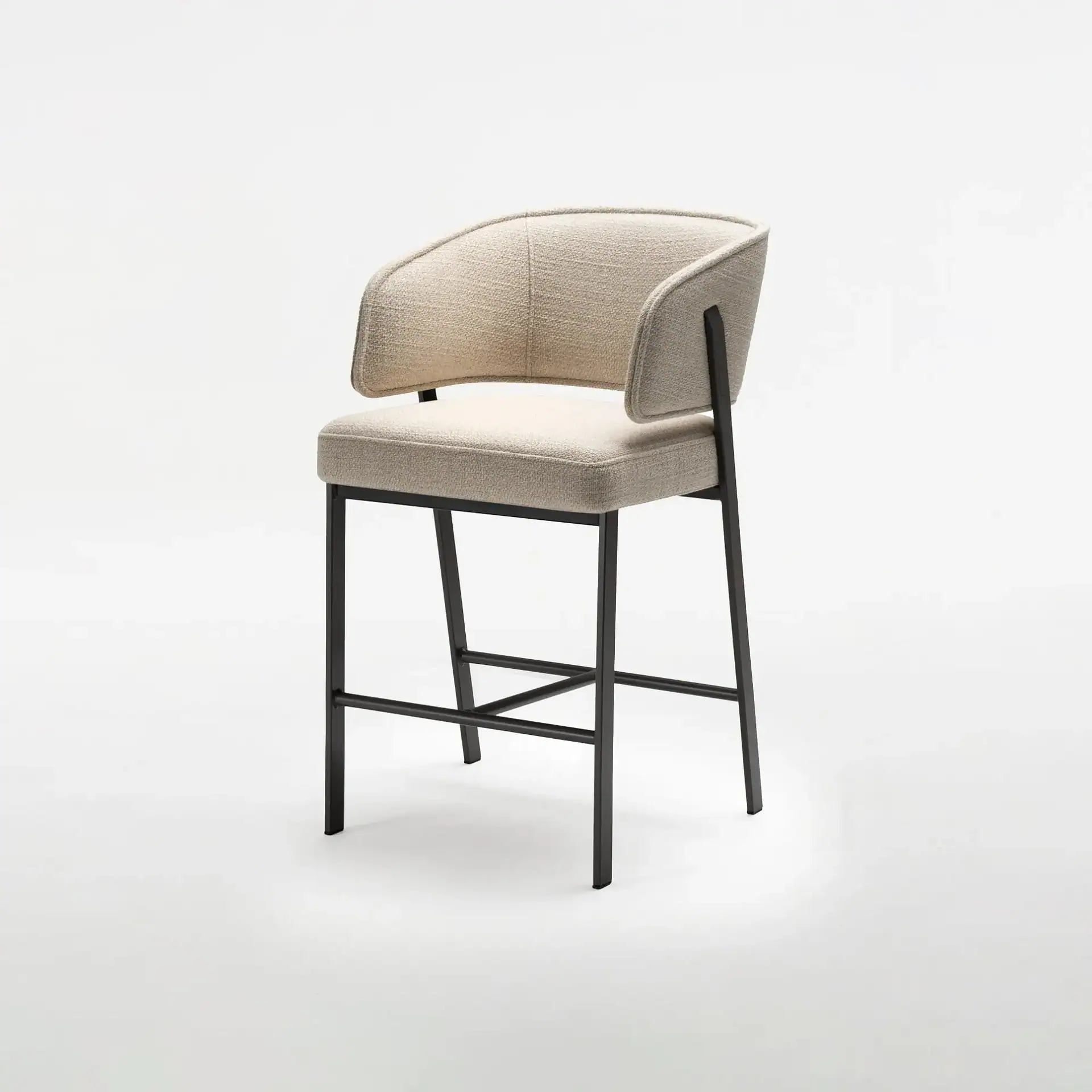 Sklar Furnishings Madison bar stool with beige upholstery and black metal frame.