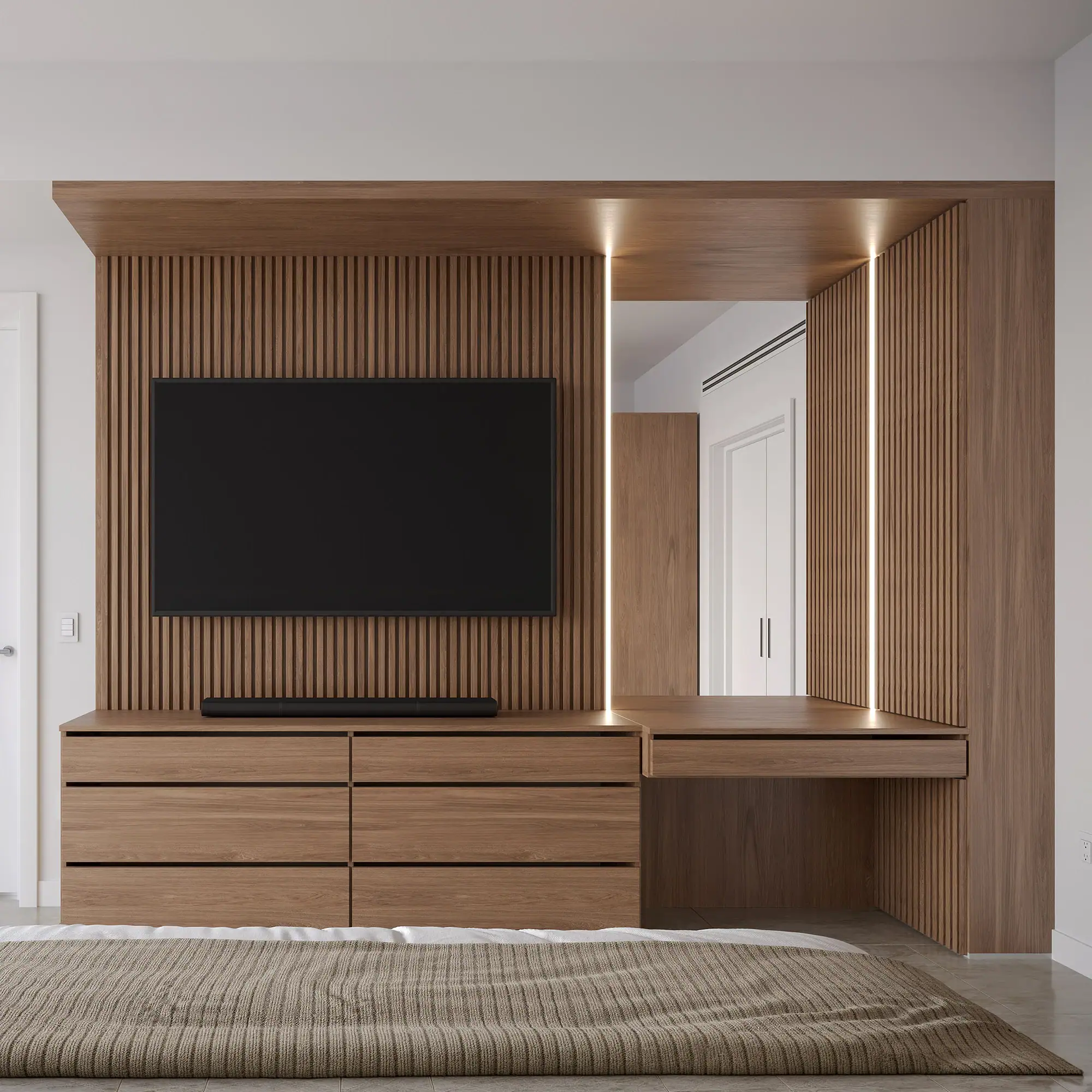 Modern wood entertainment center with TV and built-in lighting.
