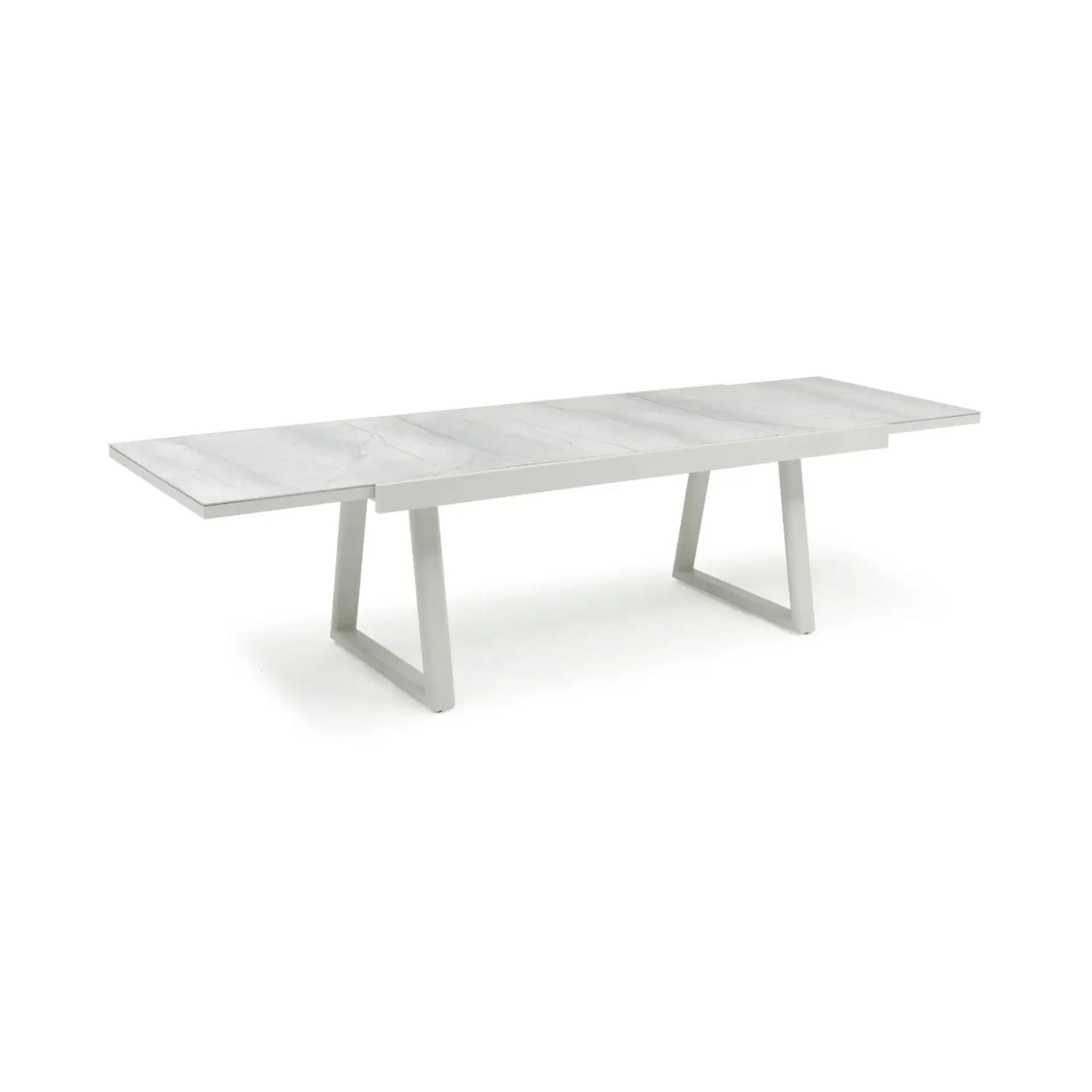 A modern extendable dining table with a light gray marble-look top and a white metal frame, shown against a white background.