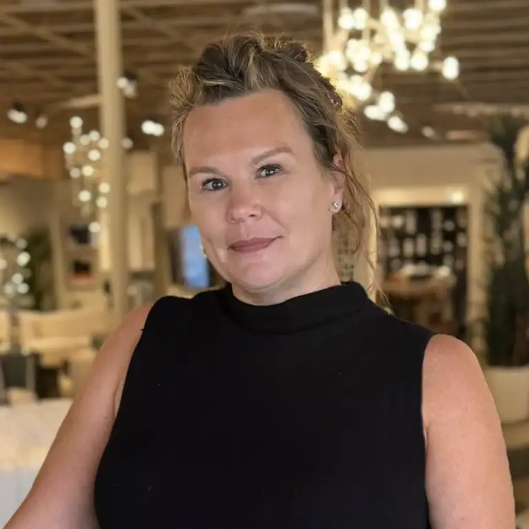 Danelle Weintzweig speaking in a showroom setting.