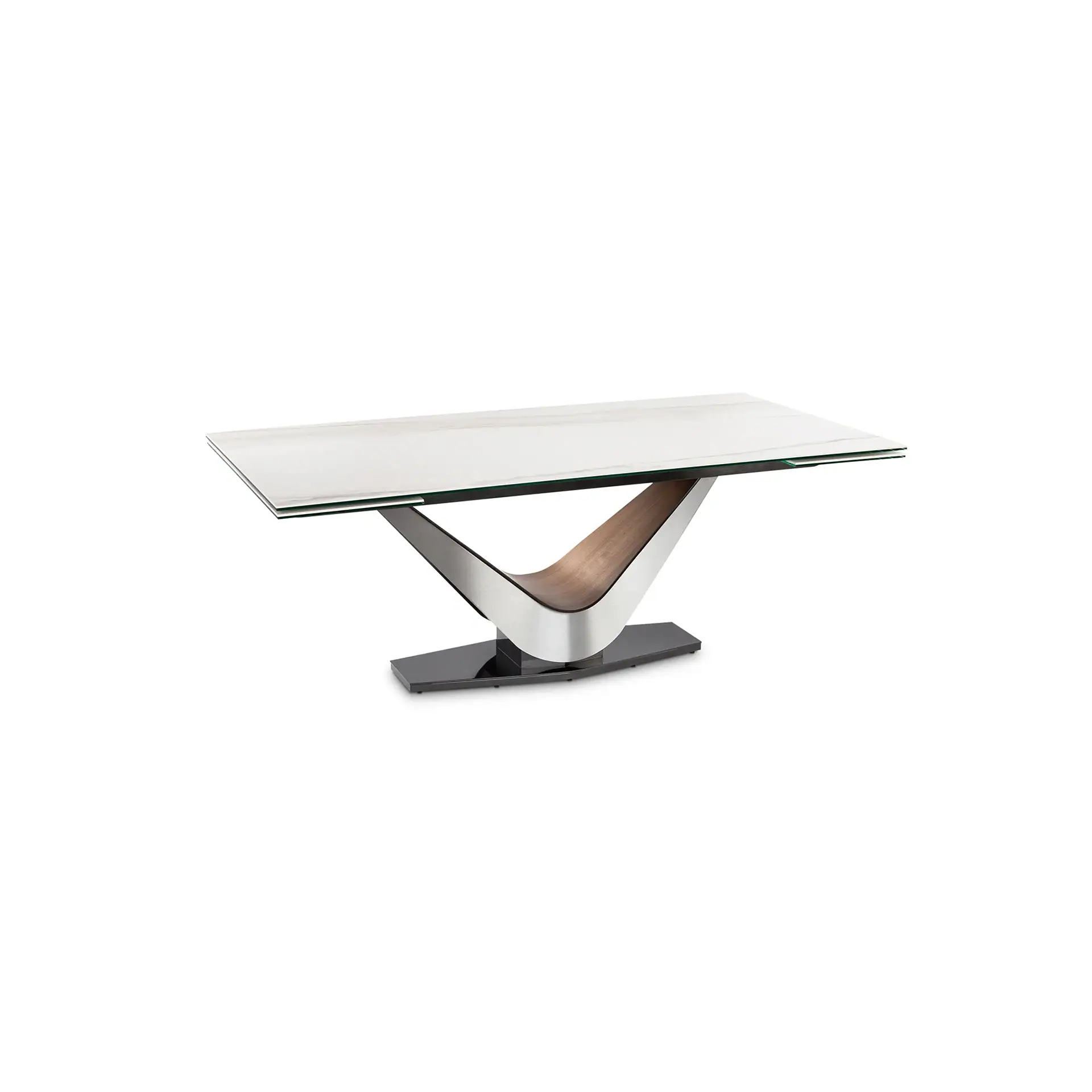 Rectangular dining table with a white marble-look top, clear glass layer, and a V-shaped base made of brushed silver metal and warm brown wood, resting on a black platform.