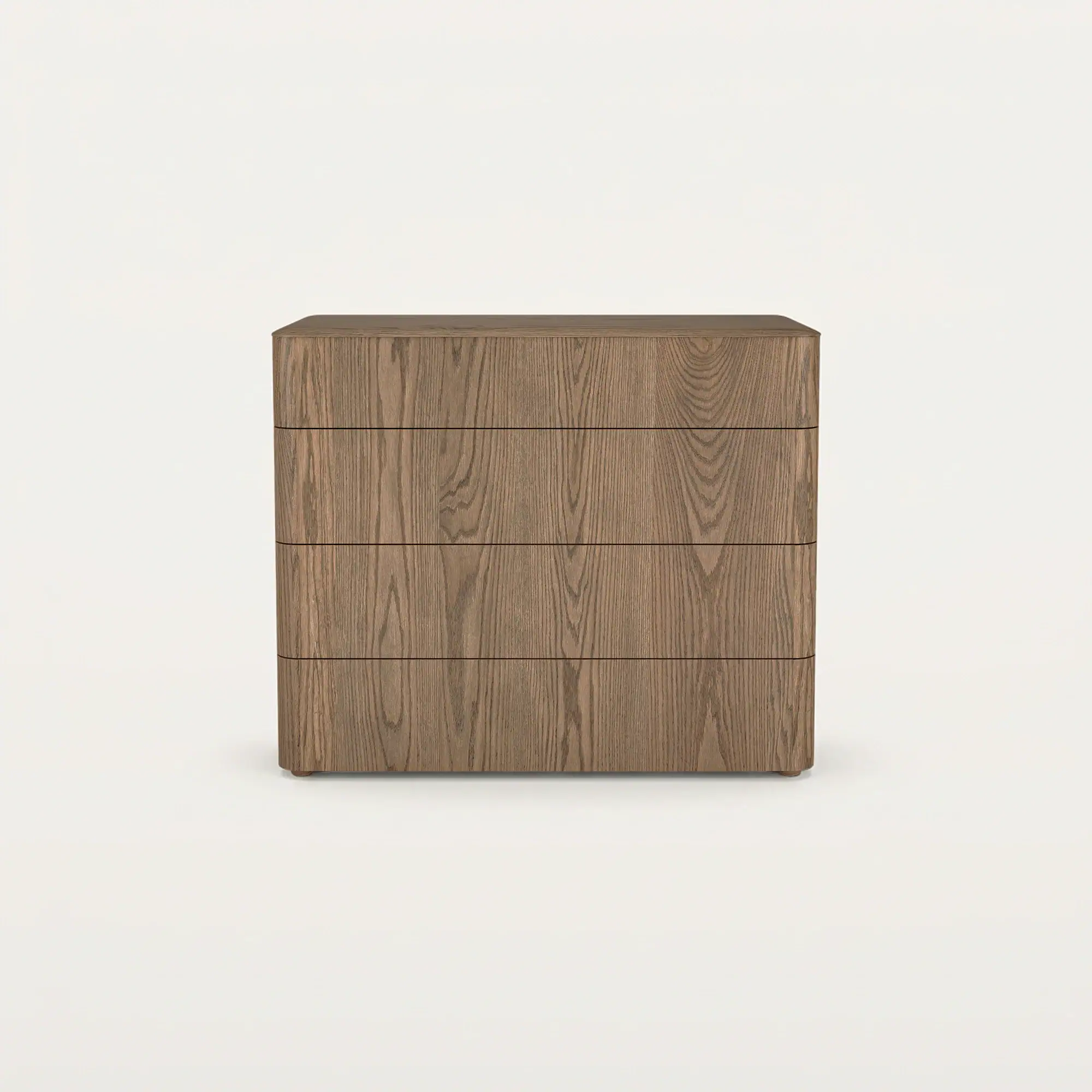 A light brown wooden chest of four drawers with rounded corners and no visible handles, set against a white background.