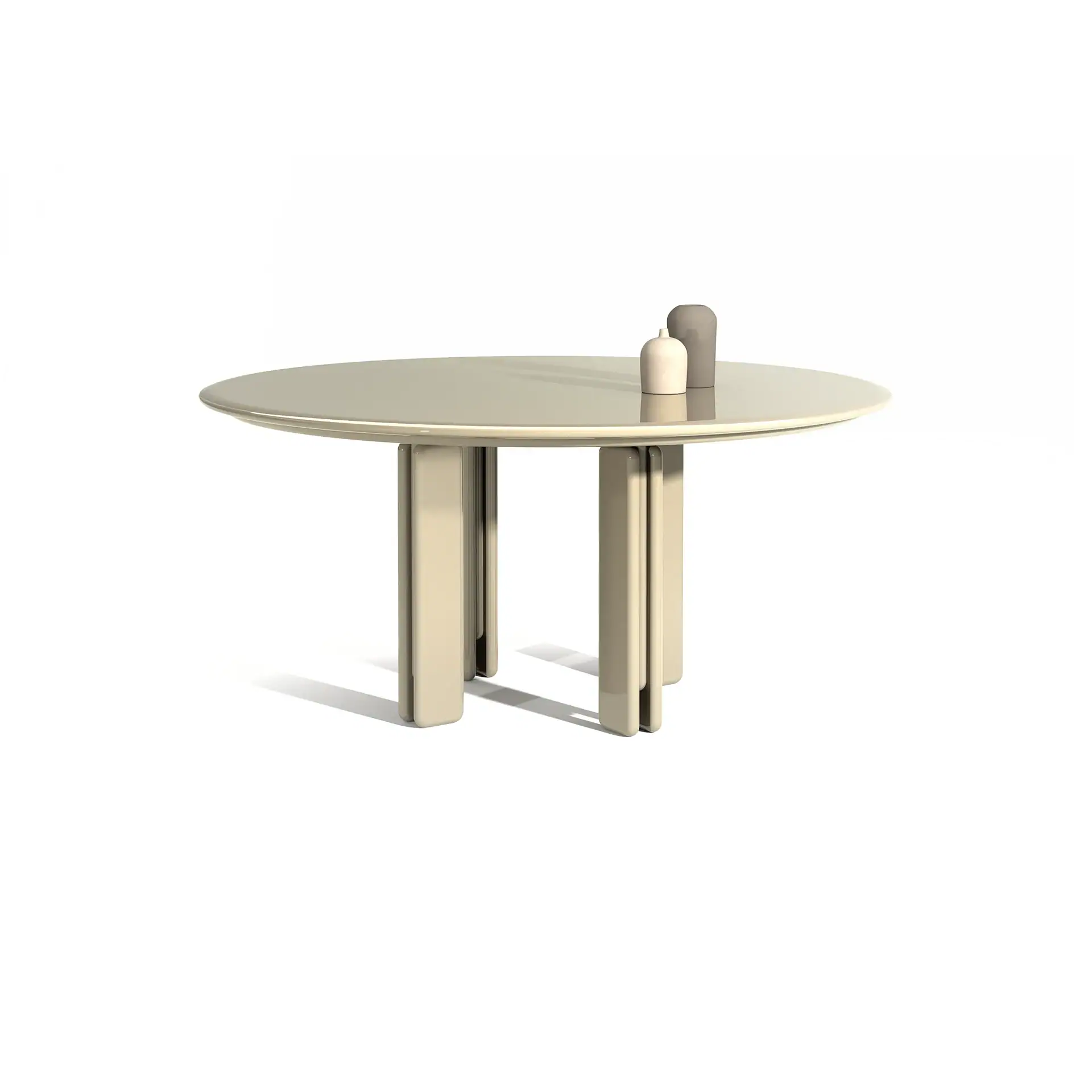 A round, glossy light beige dining table with thick, rectangular legs. On the table are a small cream vase and a taller gray block.