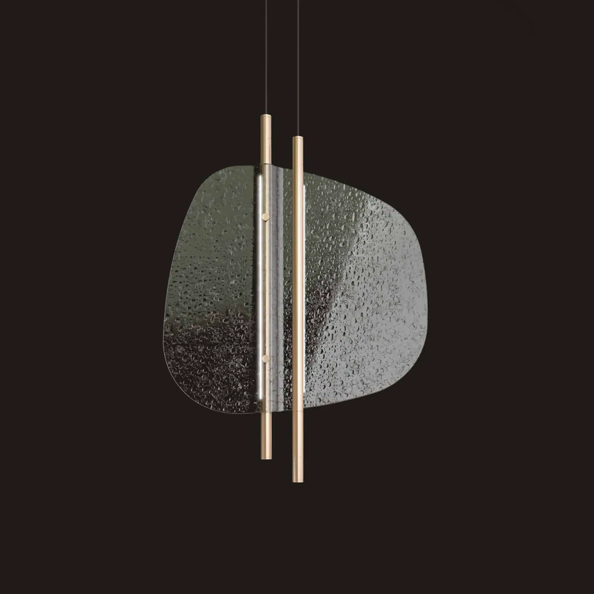 A modern pendant light with an irregularly shaped, textured glass panel and two vertical metallic rods, one silver and one brass, against a dark background.