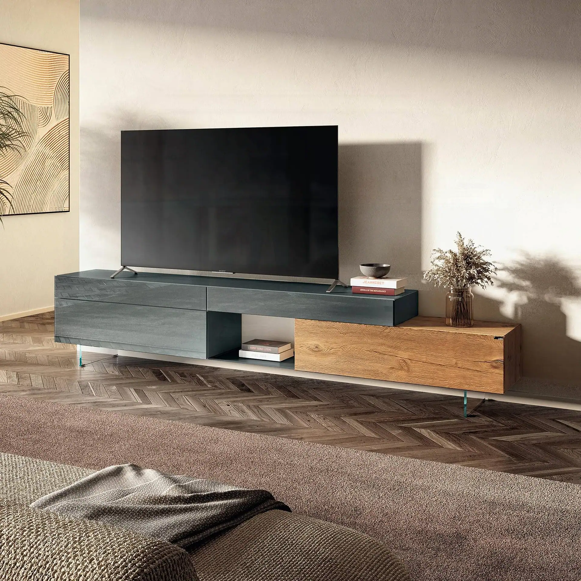 Sklar Furnishings modern TV console with a flat-screen TV and decorative items.