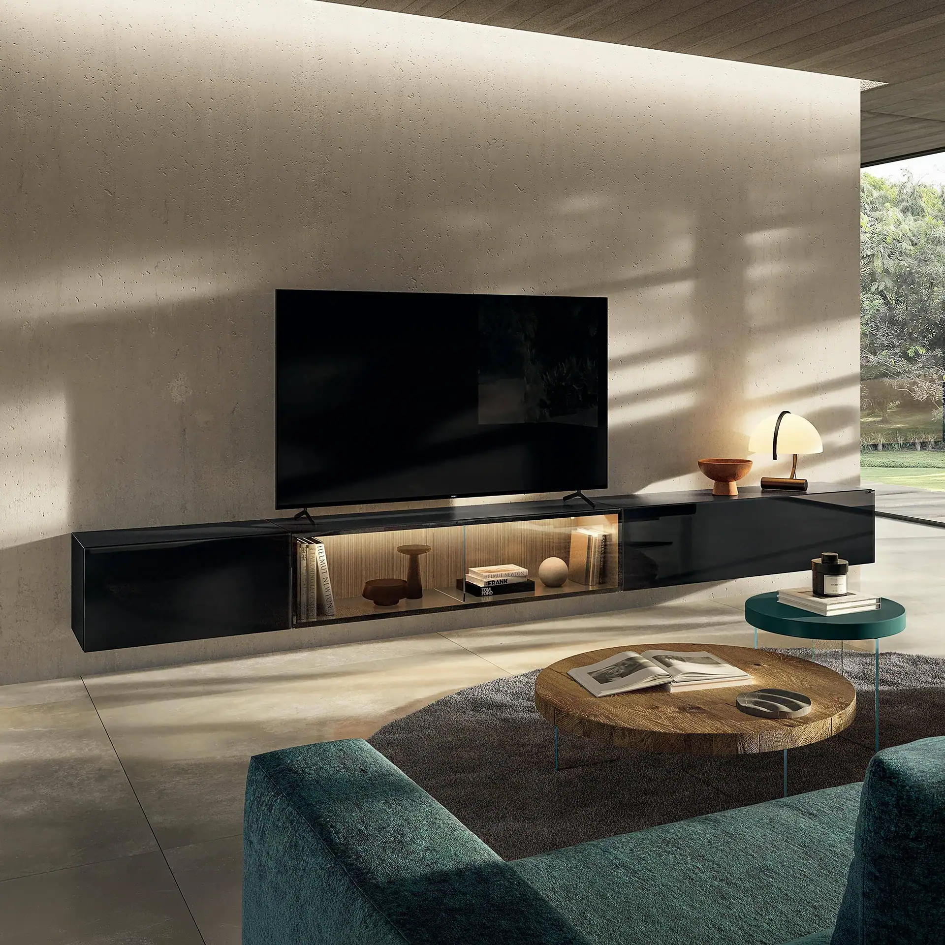 Sklar Furnishings black TV console with glass display and decorative items.