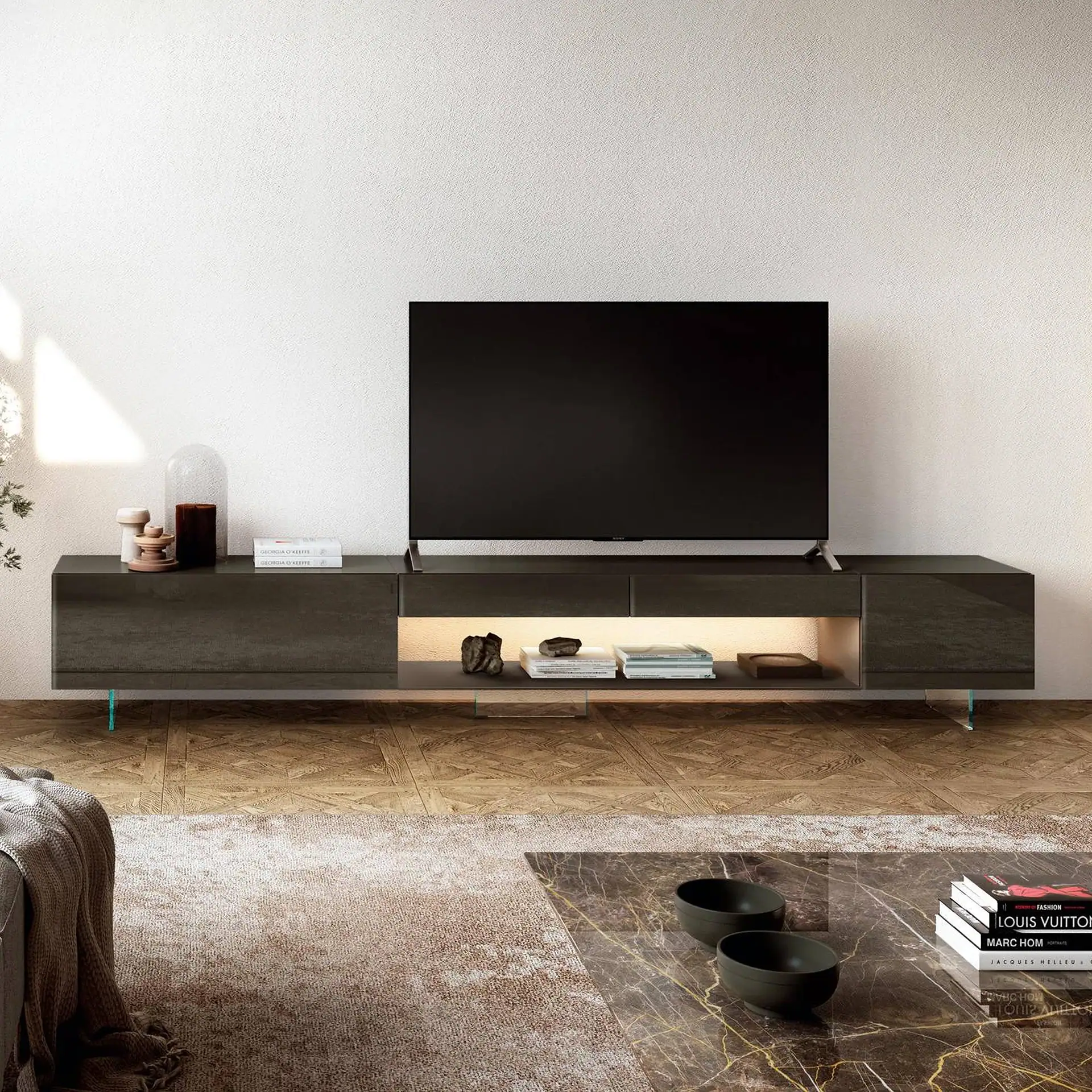 Sklar Furnishings modern TV console with open shelf and closed cabinets in a living room.