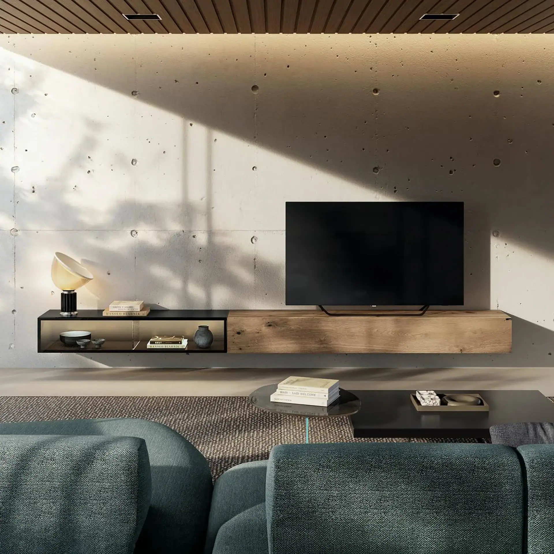 Wall-mounted TV console with open shelf and closed storage in a minimalist living room.