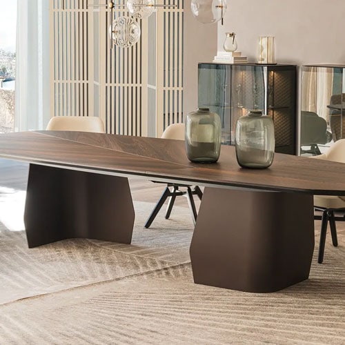 Sklar Furnishings modern dining table with black base and wooden top in a contemporary room.