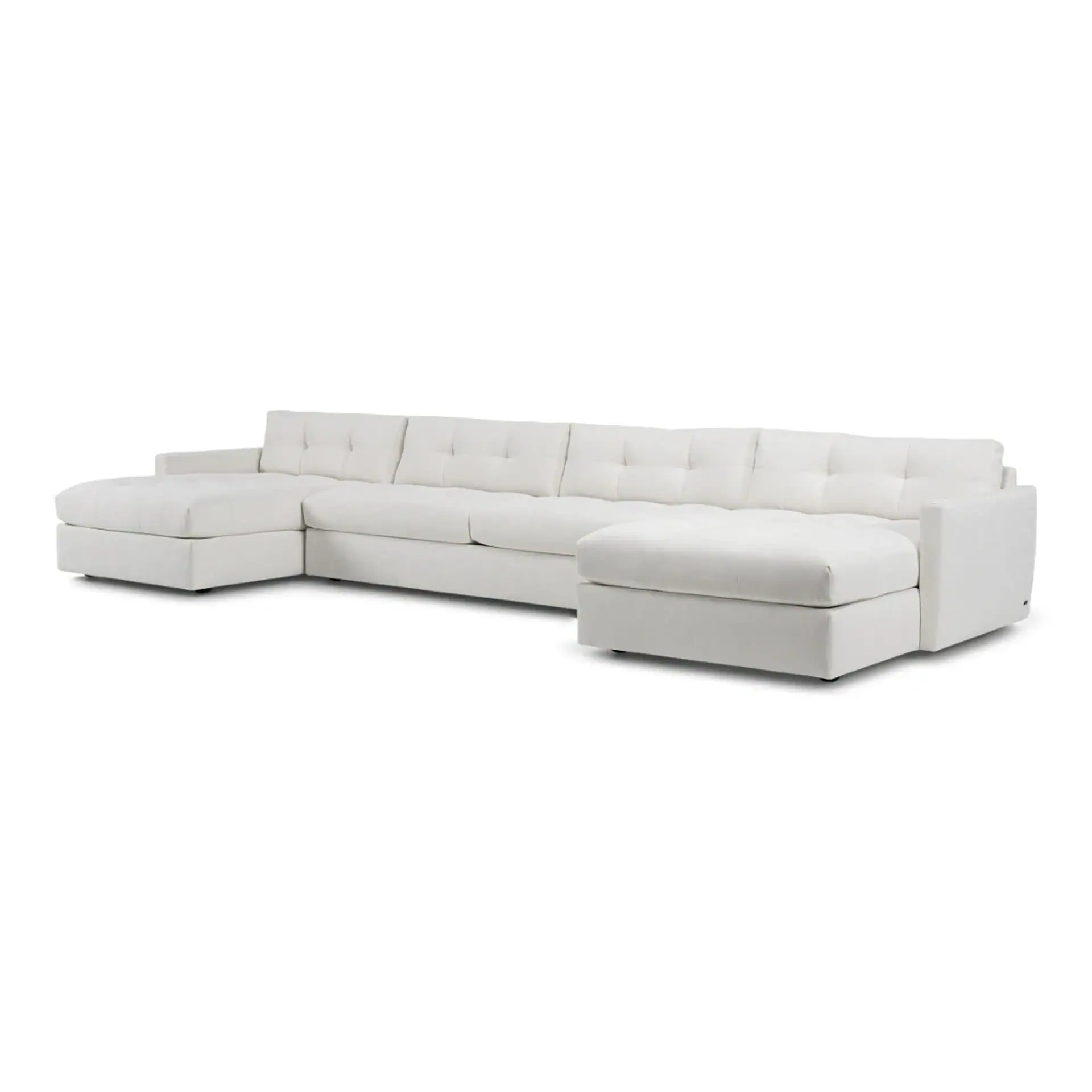 A large white U-shaped sectional sofa with tufted back cushions and two chaises, against a white background.