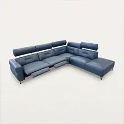 Sklar Furnishings blue sectional sofa with adjustable headrests in a modern room.