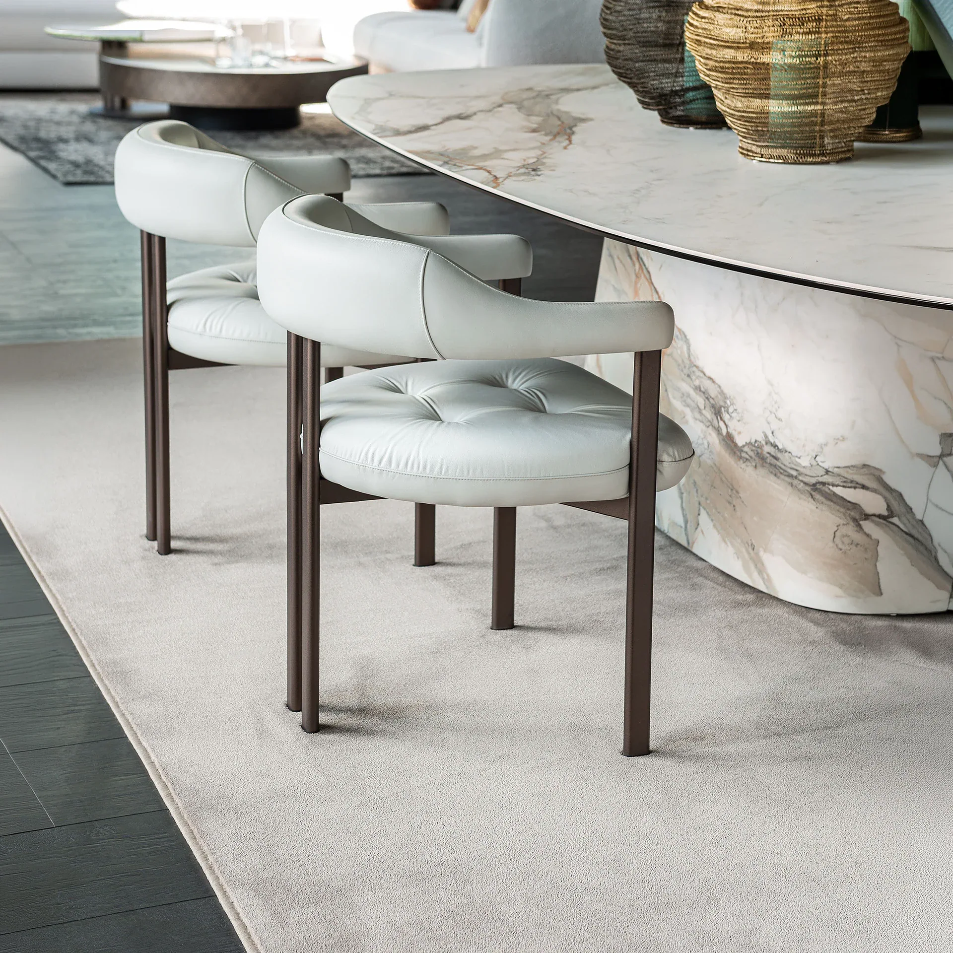 Sklar Furnishings Greta dining armchair arrangement at marble table.