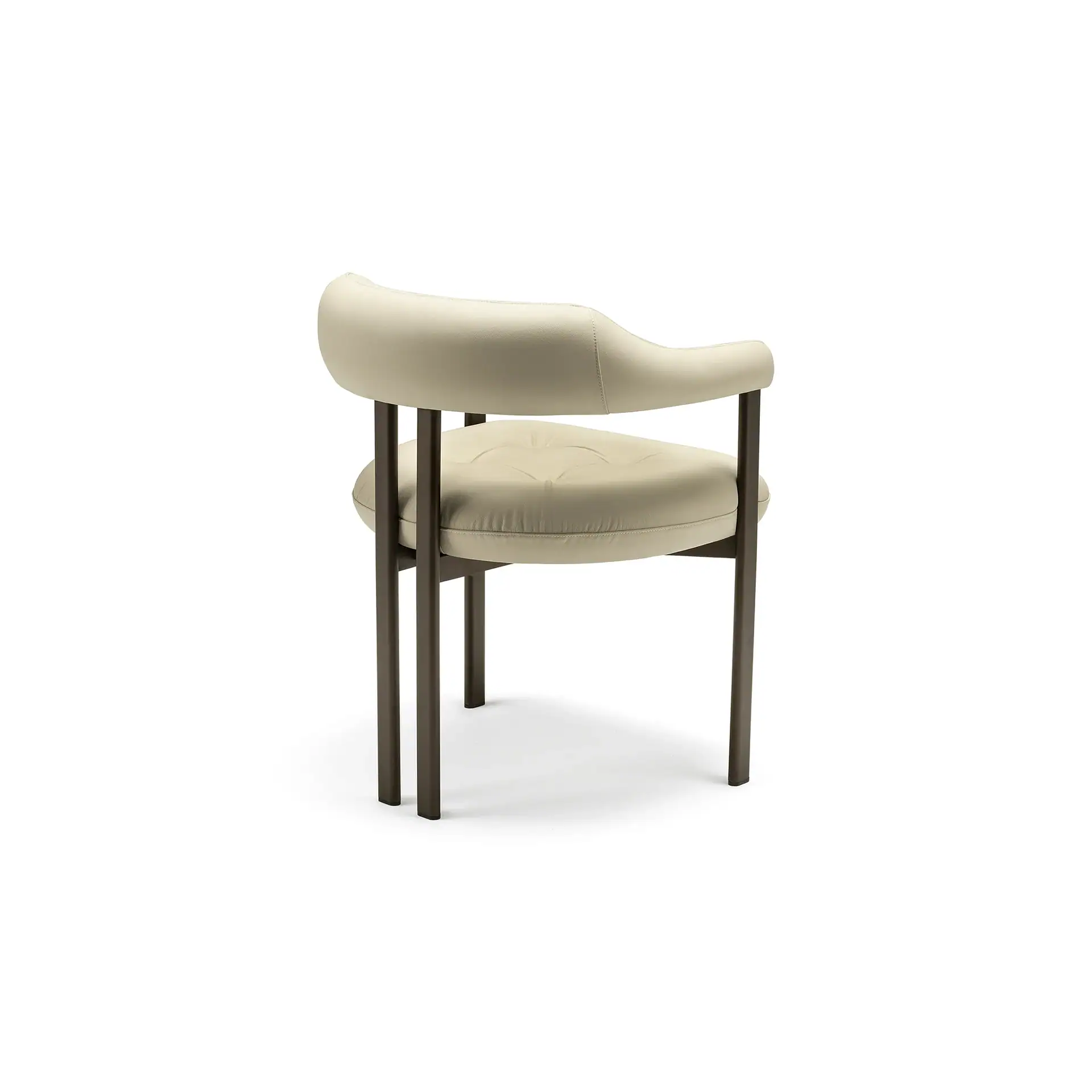 Sklar Furnishings armchair with cream upholstery and dark wooden legs in a simple, modern design.