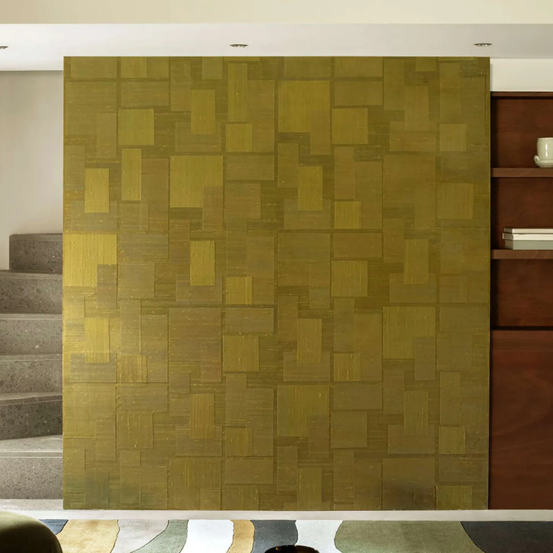 Transgression Wallpaper with geometric panel pattern in olive tones.