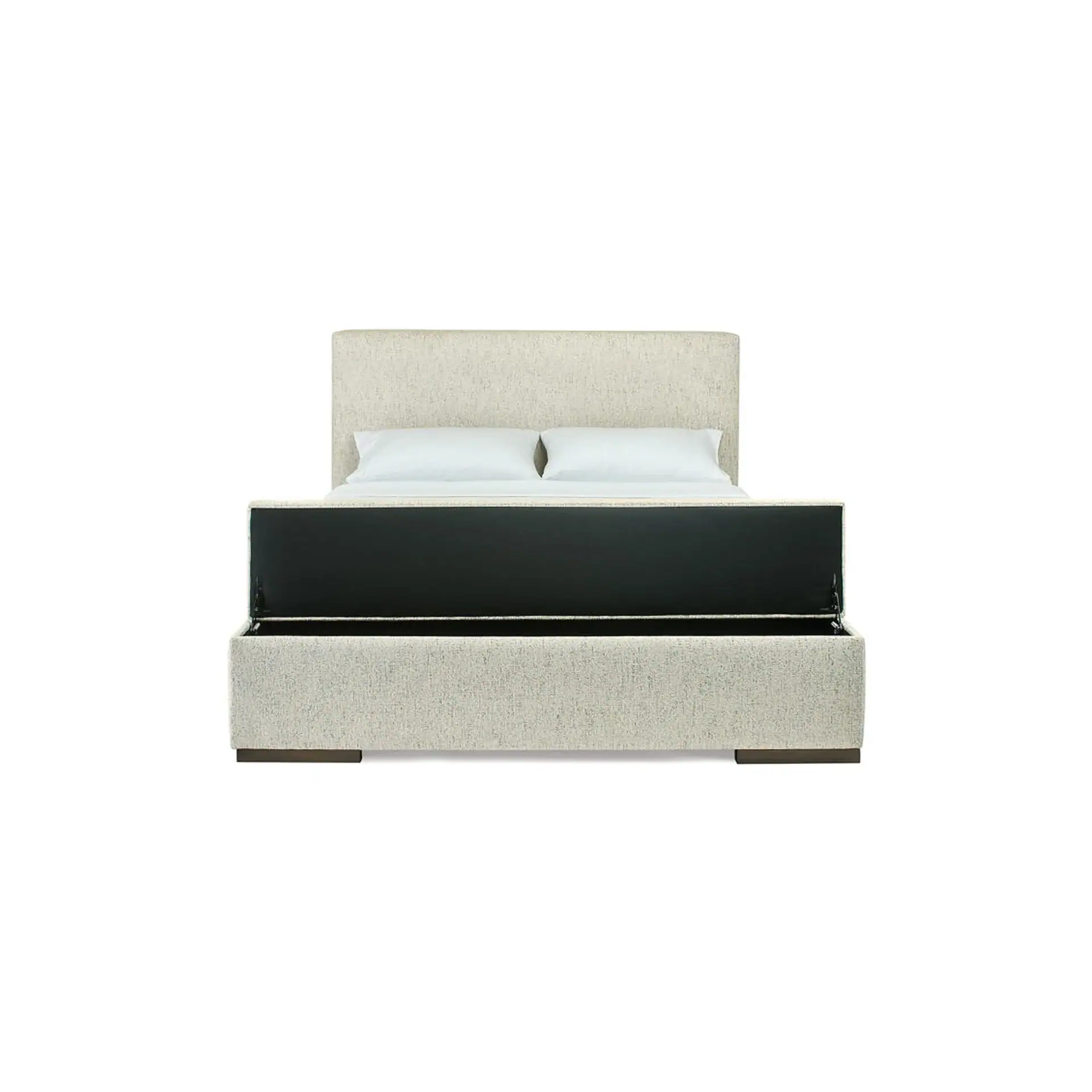 Front view of an upholstered bed with a beige textured fabric. The mattress is lifted, revealing a dark storage compartment underneath. Two white pillows are on the bed.