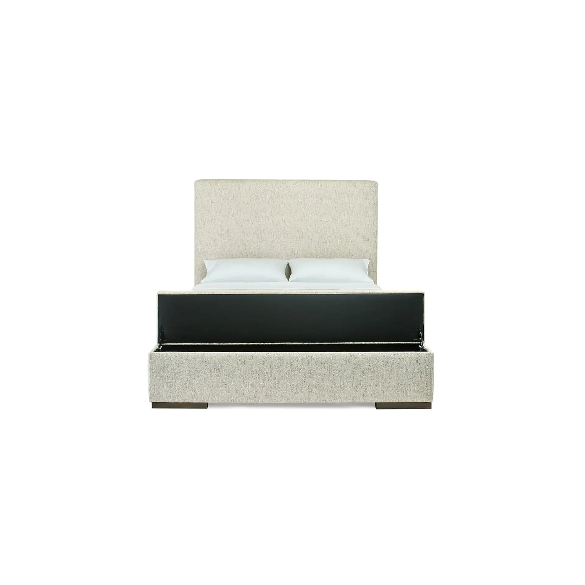 Front view of an upholstered bed with a tall, light beige fabric headboard and an open storage ottoman at the foot. Two white pillows rest against the headboard.