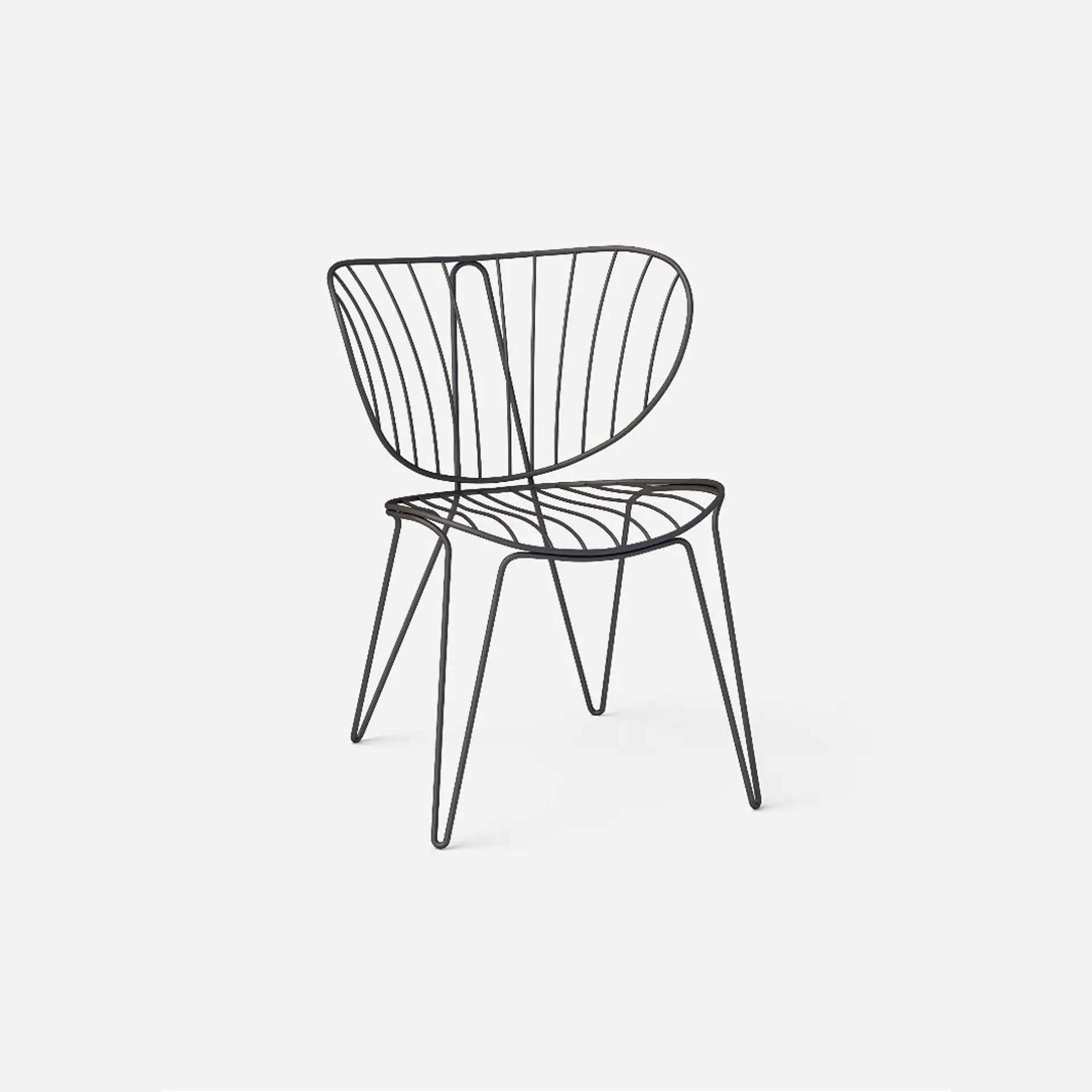 A dark metal wireframe chair with a curved, slatted backrest and seat, supported by four hairpin legs, against a light gray background.