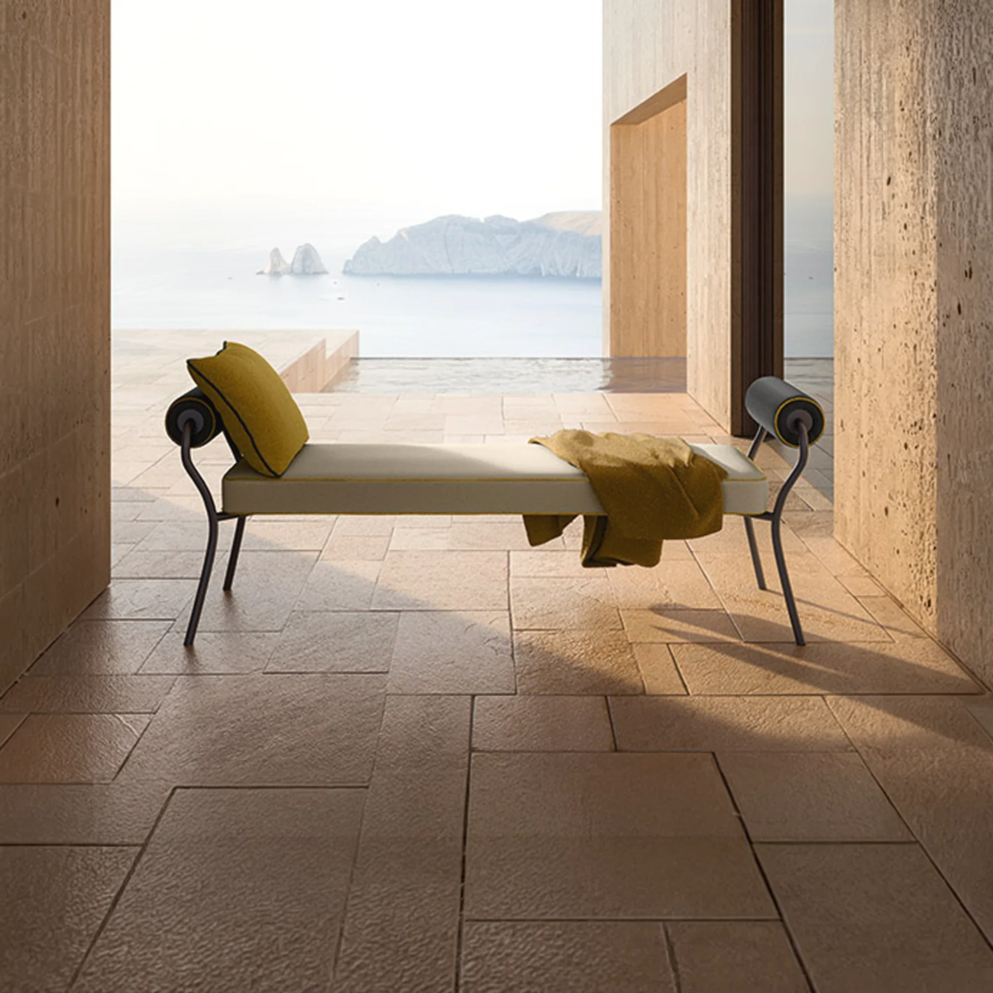 A modern beige bench with yellow accents sits on a tiled floor, overlooking a sea view with distant islands and an infinity pool.